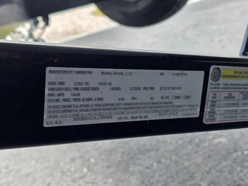 Slide: The Image of Label on 2020 Malibu 21VLX boat trailer showing specifications and compliance details. - 19