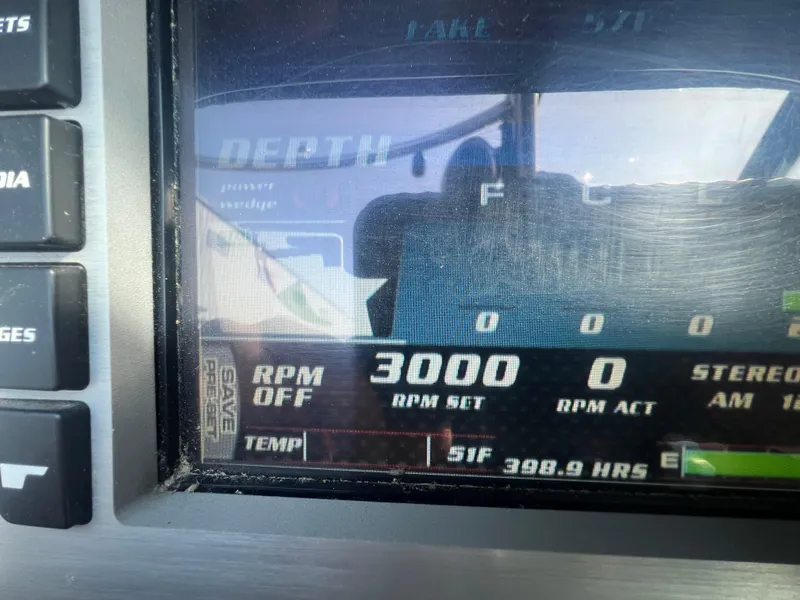 Slide: The Image of Dashboard of 2014 Malibu W23LSV showing RPM and engine hours. - 11