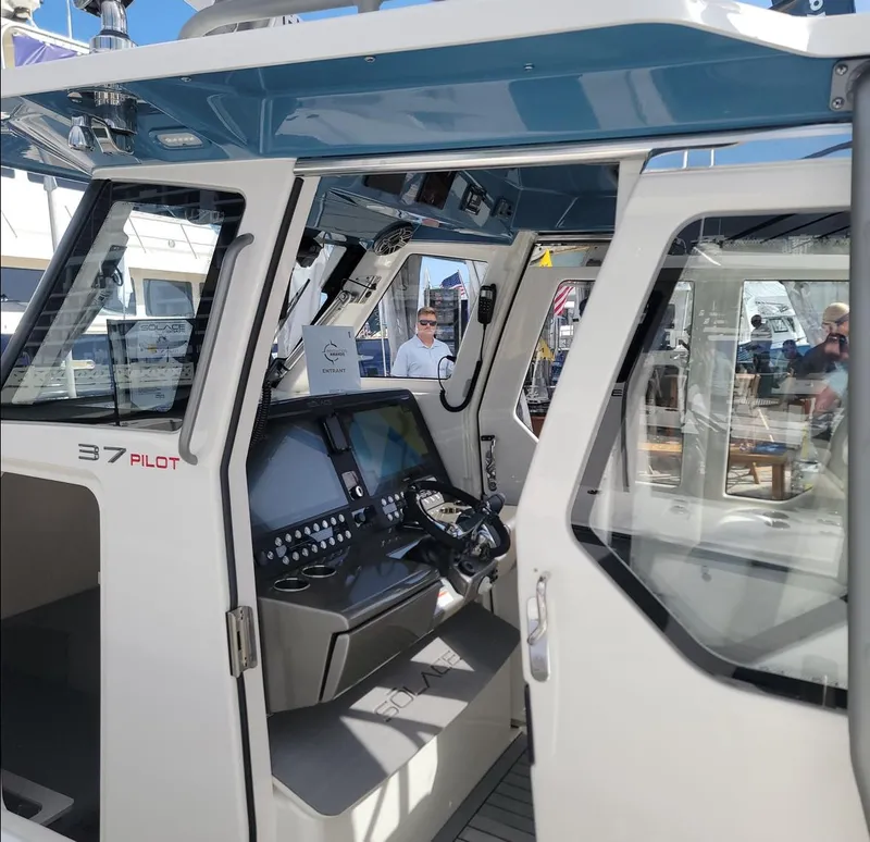 Slide: The Image of 2025 Solace 37 PILOT boat cockpit with advanced navigation controls and modern design. - 6