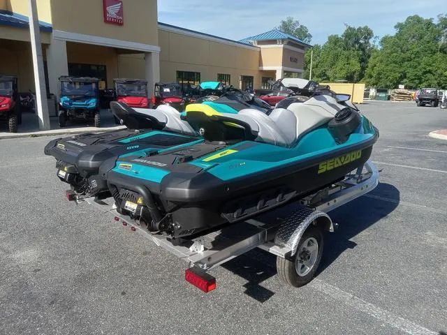 Slide: The Image of 2025 Sea-Doo Waverunner GTR™ 230 Ibr on trailer, parked outside dealership. - 11