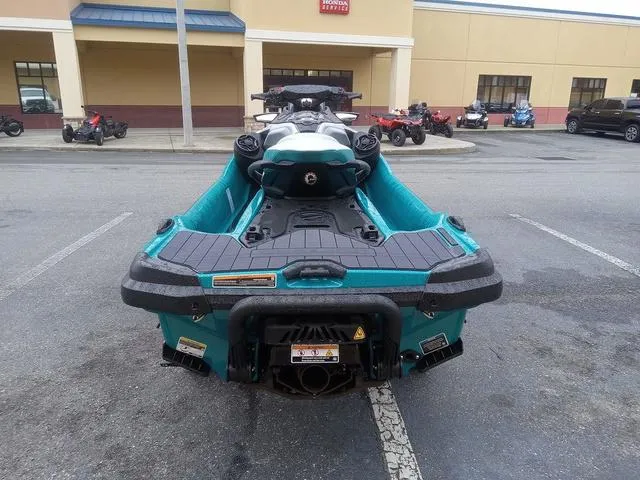 Slide: The Image of 2025 Sea-Doo Waverunner GTX in parking lot, rear view. - 12