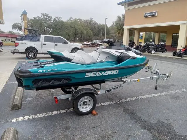 Slide: The Image of 2025 Sea-Doo Waverunner GTX on trailer in parking lot. - 15