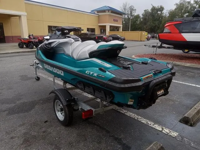 Slide: The Image of 2025 Sea-Doo Waverunner GTX on trailer in parking lot. - 17