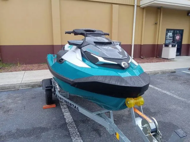 Slide: The Image of 2025 Sea-Doo Waverunner GTX on trailer, parked in a lot, ready for adventure. - 5