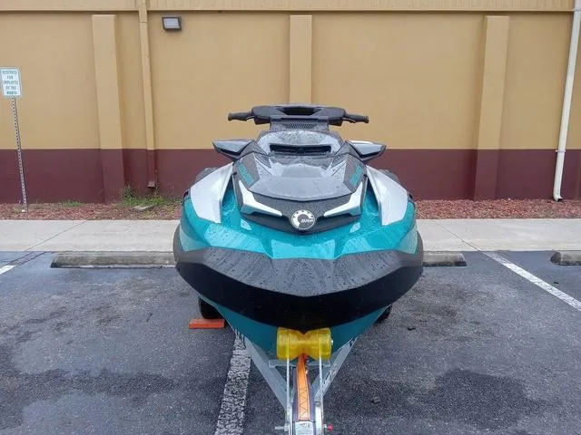 Slide: The Image of 2025 Sea-Doo Waverunner GTX parked in a lot, front view. - 6