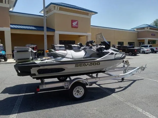Slide: The Image of 2025 Sea-Doo Waverunner FISH PRO on trailer in parking lot. - 12