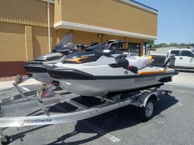 Slide: The Image of 2025 Sea-Doo Waverunner FISH PRO on trailer, parked outside a building. - 7