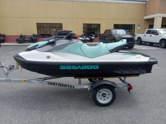 Slide: The Image of 2025 Sea-Doo Waverunner GTI on trailer, parked in a lot. - 13