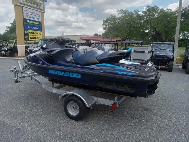 Slide: The Image of 2025 Sea-Doo Waverunner FISH PRO on trailer at dealership. - 14