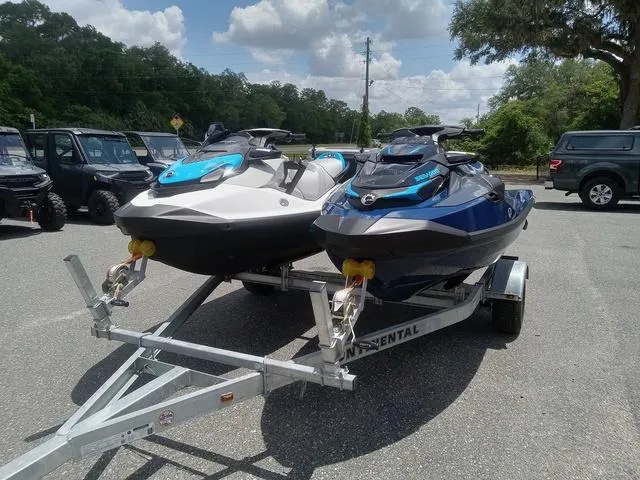 Slide: The Image of 2025 Sea-Doo Waverunner FISH PRO models on a trailer in a parking lot. - 6