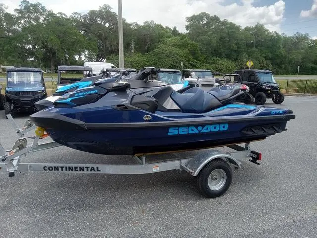 Slide: The Image of 2025 Sea-Doo Waverunner FISH PRO on trailer, parked outdoors. - 8