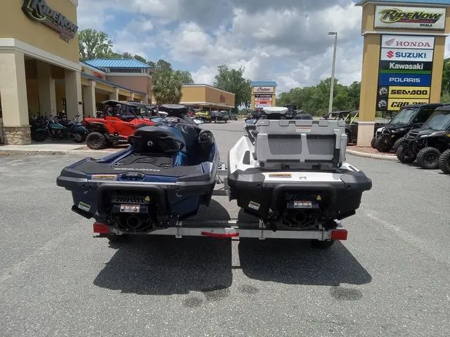 Slide: The Image of 2025 Sea-Doo Waverunner FISH PRO models parked at dealership, rear view. - 9