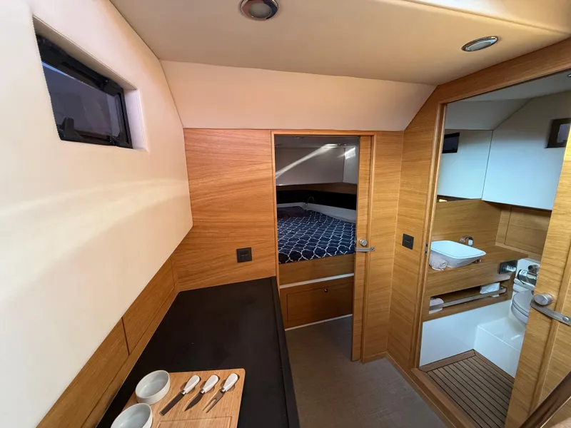Slide: The Image of Luxurious interior of 2021 De Antonio Yachts D42, featuring wood finishes and modern amenities. - 12