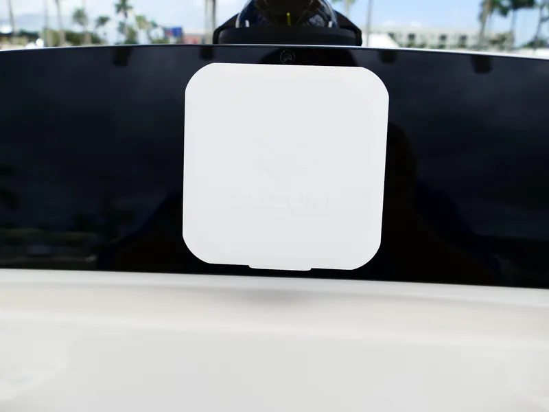 Slide: The Image of 2026 Pioneer 202 Islander boat detail with white square feature, outdoor setting. - 22