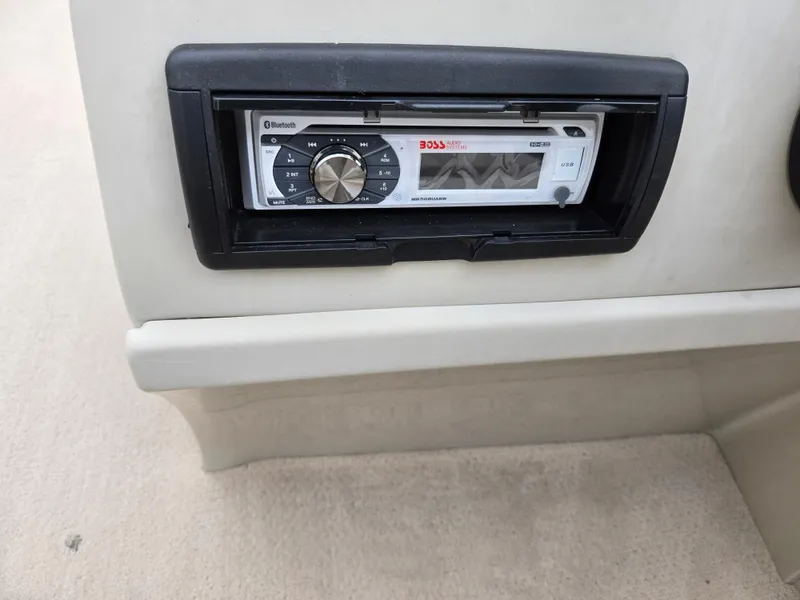 Slide: The Image of Stereo system in a 2010 Harris FloteBote 200 Cruiser CX boat dashboard. - 23