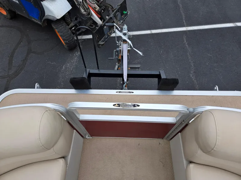 Slide: The Image of 2010 Harris FloteBote 200 Cruiser CX pontoon boat interior with trailer hitch. - 25