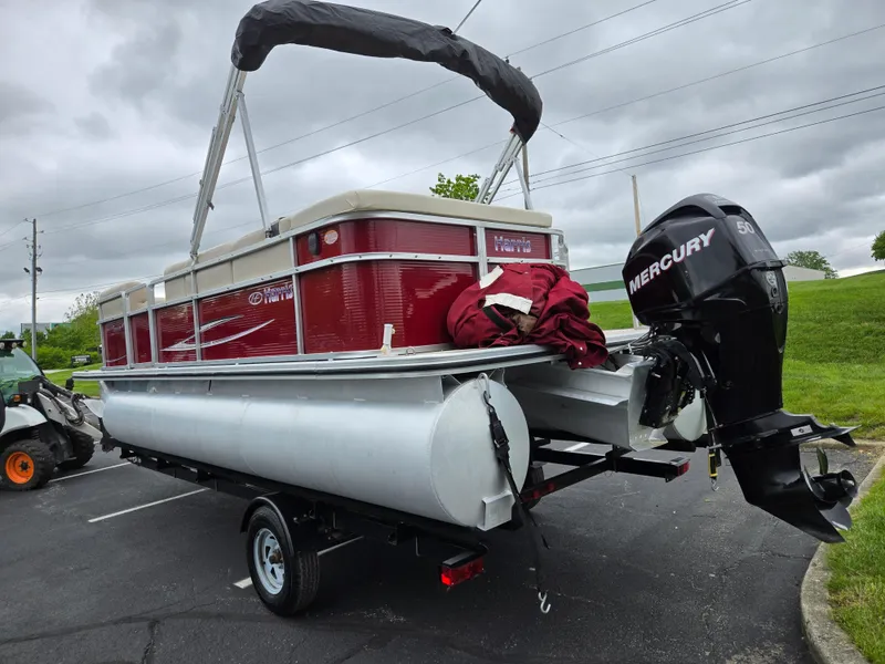 Slide: The Image of 2010 Harris FloteBote 200 Cruiser CX pontoon boat with Mercury outboard motor on trailer. - 3