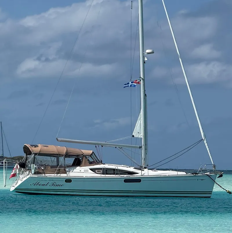 The Image of Sailboat Jeanneau Sun Odyssey 45 DS 2011 anchored in turquoise waters. - 0