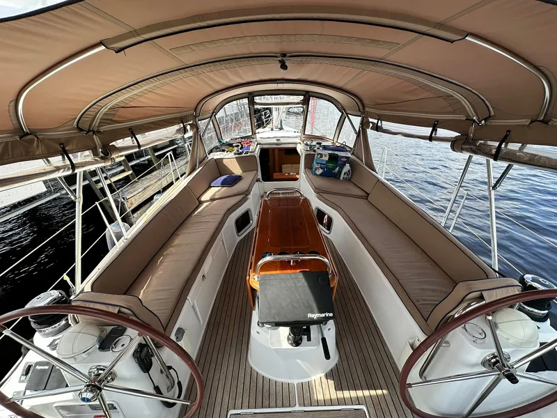 Slide: The Image of 2011 Jeanneau Sun Odyssey 45 DS sailboat cockpit with spacious seating and dual steering wheels. - 20