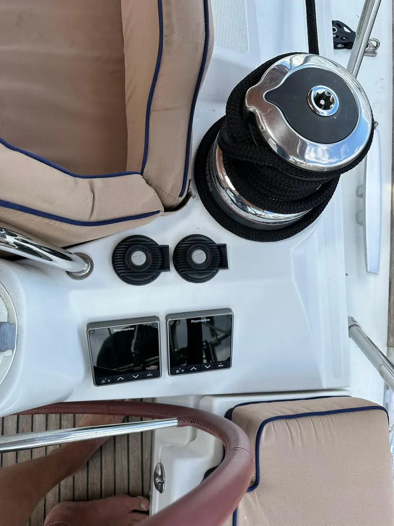 Slide: The Image of Cockpit view of 2011 Jeanneau Sun Odyssey 45 DS sailboat with winch and seating. - 22
