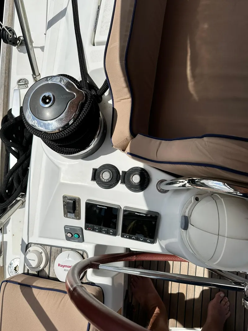 Slide: The Image of Cockpit of 2011 Jeanneau Sun Odyssey 45 DS sailboat with navigation controls. - 23