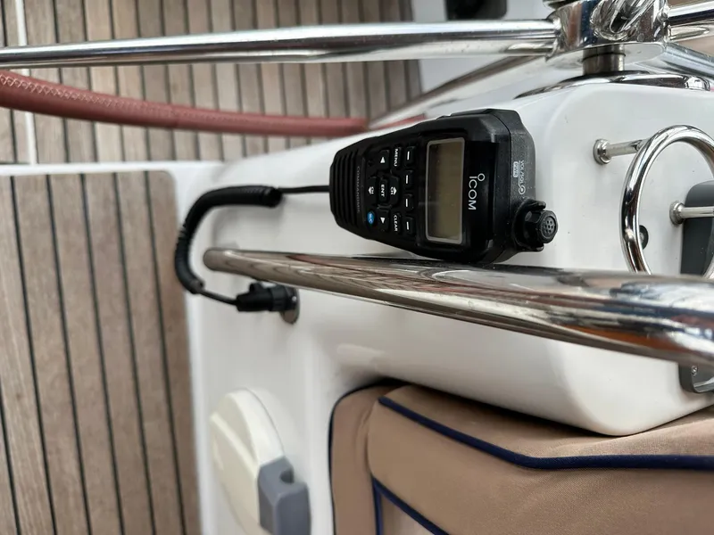 Slide: The Image of 2011 Jeanneau Sun Odyssey 45 DS yacht cockpit with Icom radio and teak flooring. - 25