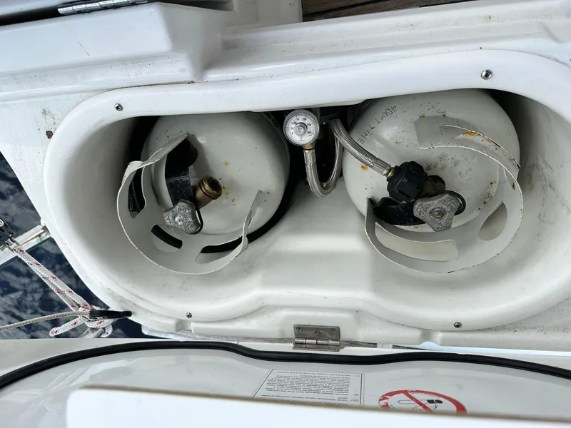 Slide: The Image of Propane tanks in storage compartment on 2011 Jeanneau Sun Odyssey 45 DS sailboat. - 30