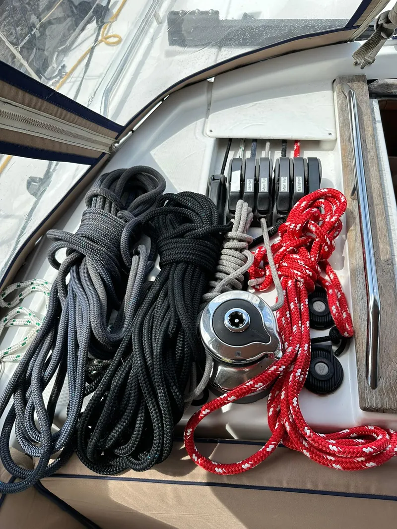Slide: The Image of Ropes and winch on Jeanneau Sun Odyssey 45 DS, 2011 model sailboat deck. - 31