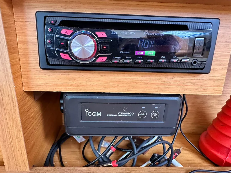 Slide: The Image of Stereo and communication equipment on a 2011 Jeanneau Sun Odyssey 45 DS yacht. - 45