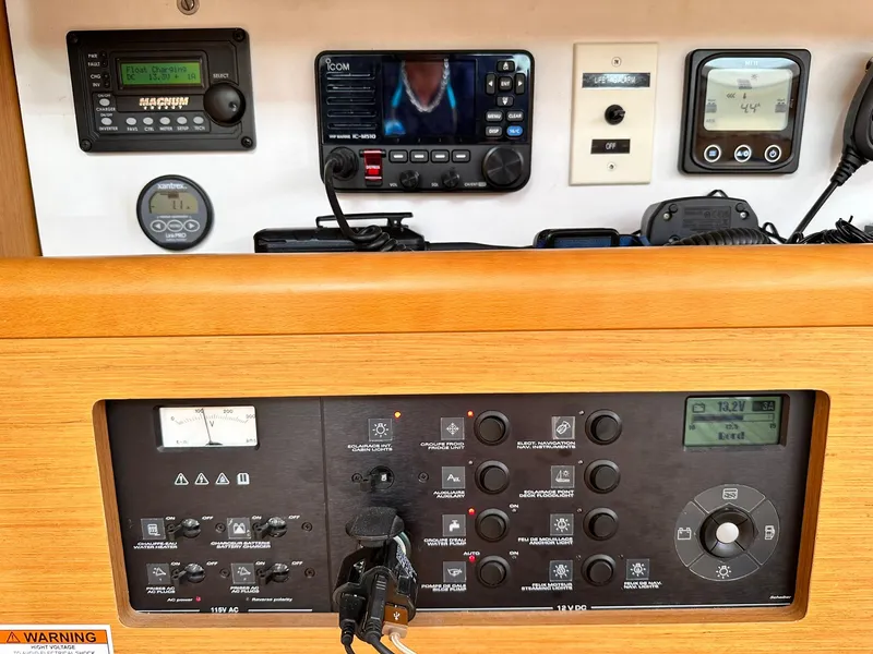 Slide: The Image of Control panel of a 2011 Jeanneau Sun Odyssey 45 DS sailboat with navigation instruments. - 46