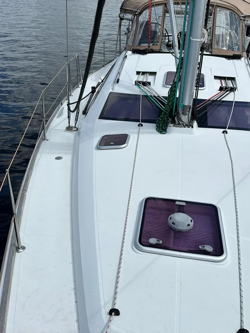 Slide: The Image of 2011 Jeanneau Sun Odyssey 45 DS sailboat deck with hatch and rigging. - 5