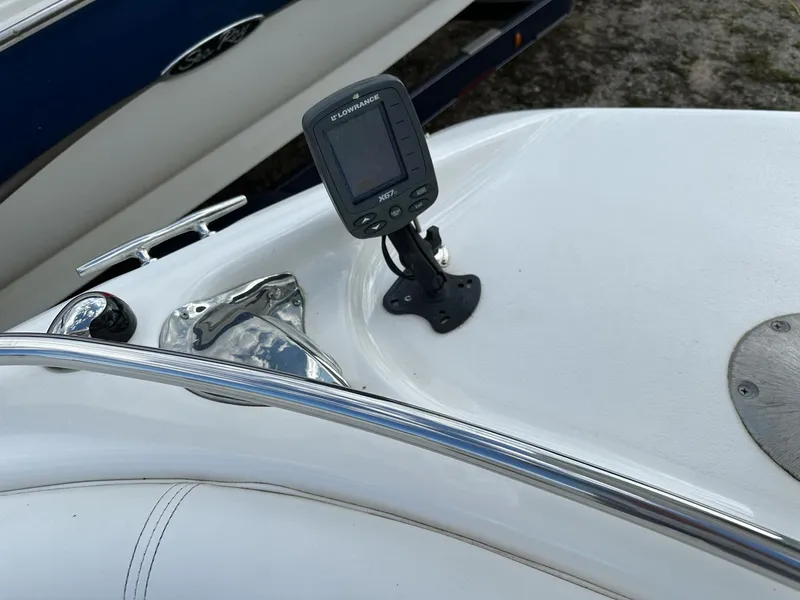 Slide: The Image of 2012 Hurricane SunDeck 237 OB boat dashboard with mounted fishfinder. - 9