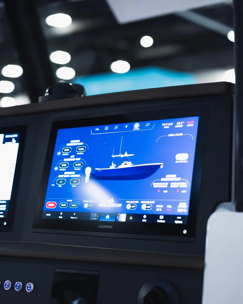 Slide: The Image of 2026 Regulator 35 boat dashboard with advanced navigation display. - 10
