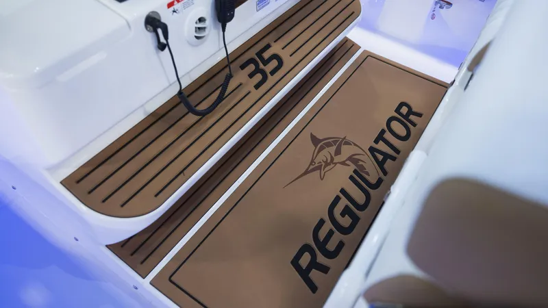 Slide: The Image of 2026 Regulator 35 boat deck with logo and model number. - 12