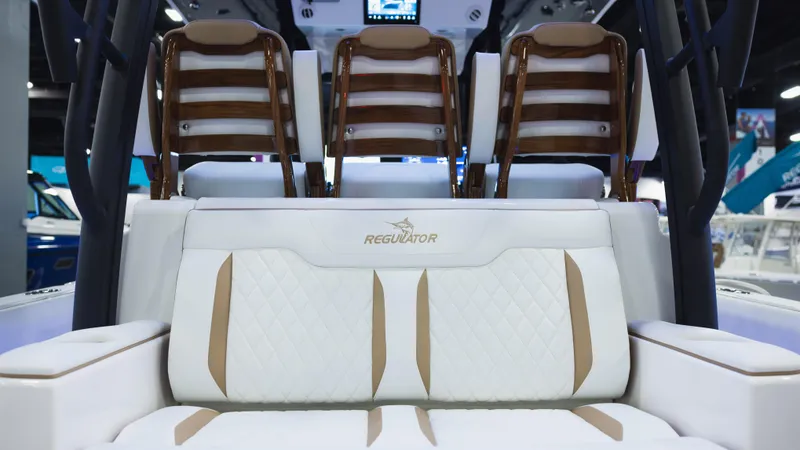 Slide: The Image of 2026 Regulator 35 boat interior with luxurious seating and elegant design. - 13