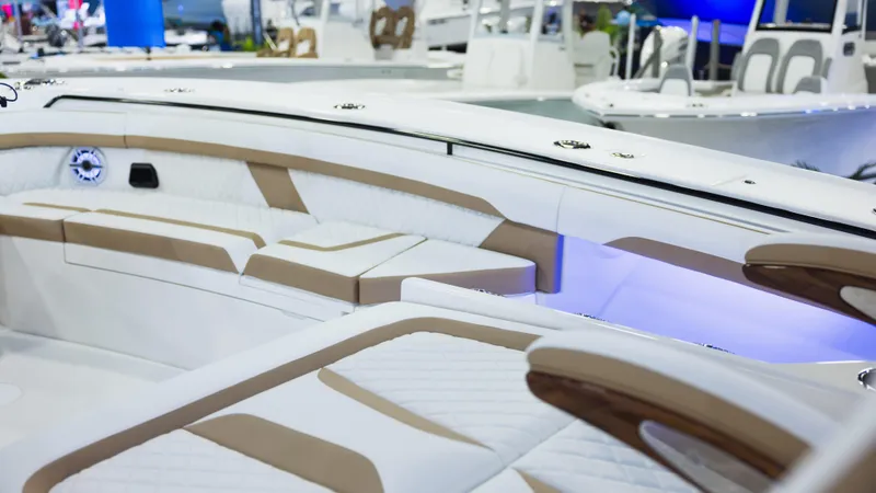 Slide: The Image of 2026 Regulator 35 boat interior with luxurious seating and ambient lighting. - 4