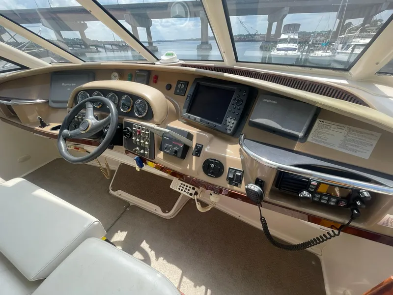 Slide: The Image of Helm of 2000 Carver 506 Motor Yacht with navigation equipment and controls. - 32