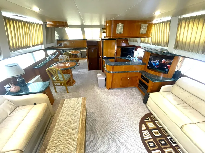 Slide: The Image of Luxurious interior of 2000 Carver 506 Motor Yacht with elegant furnishings and modern amenities. - 5