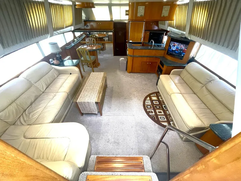 Slide: The Image of Luxurious interior of 2000 Carver 506 Motor Yacht with plush seating and modern amenities. - 4