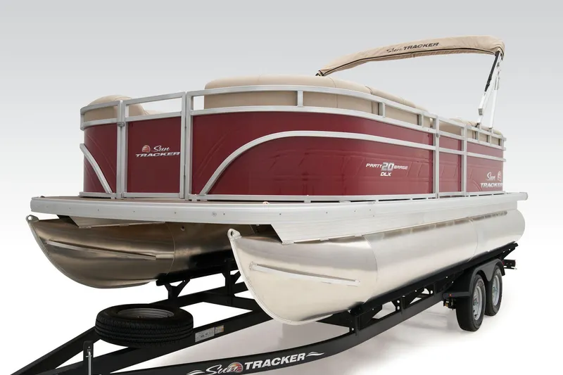 Slide: The Image of 2025 Sun Tracker Party Barge 20 DLX pontoon boat with Mercury engine on trailer. - 9