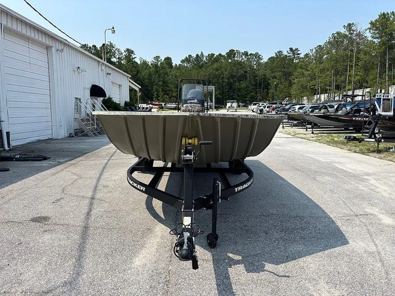Slide: The Image of 2025 Tracker Grizzly 2072 CC boat on trailer in outdoor lot. - 4
