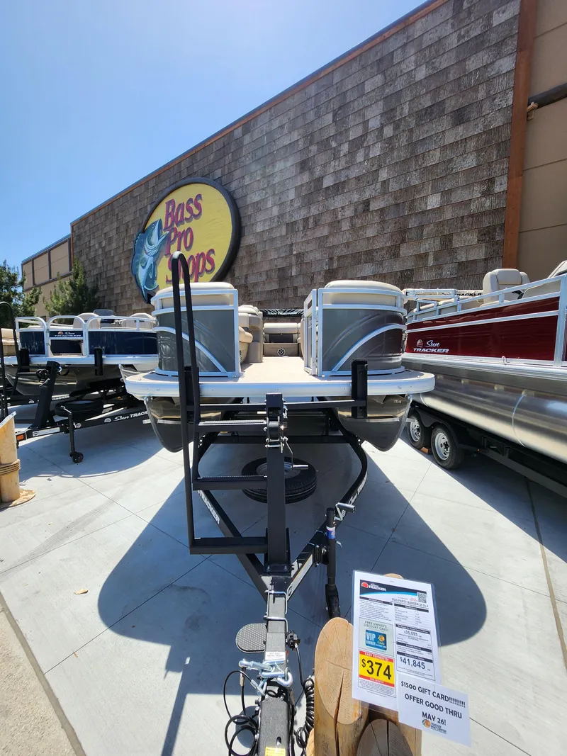 Slide: The Image of 2025 Sun Tracker Party Barge 20 DLX displayed at Bass Pro Shops. - 2