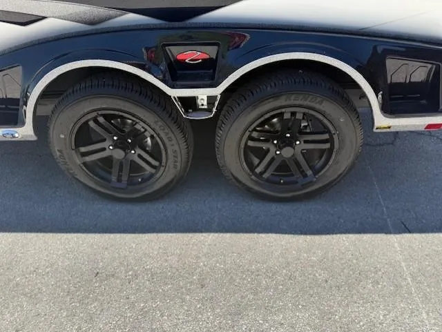 Slide: The Image of 2025 Ranger Z520R trailer with dual black wheels on pavement. - 6
