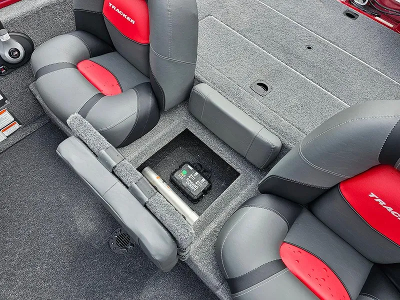 Slide: The Image of 2025 Tracker Pro Team 175 boat interior with storage compartment and seating. - 11