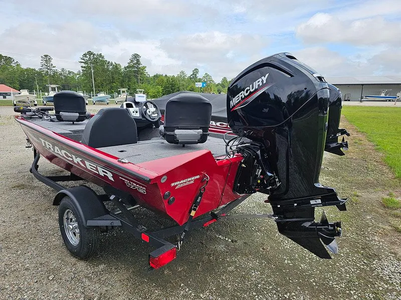 Slide: The Image of 2025 Tracker Pro Team 175 boat with Mercury engine on a trailer. - 6