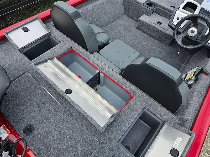 Slide: The Image of 2025 Tracker Pro Team 175 boat interior with seating and storage compartments. - 9