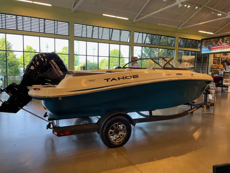 The Image of 2025 Tahoe 200 S boat displayed indoors on a trailer. - 0