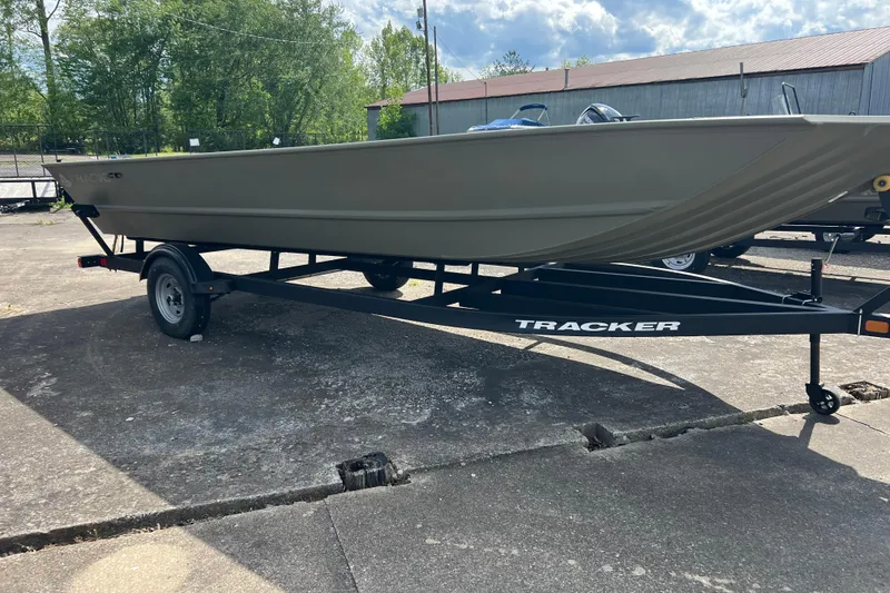 Slide: The Image of 2025 Tracker Grizzly 2072 Utility boat on trailer, parked outdoors. - 10