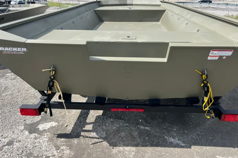 Slide: The Image of 2025 Tracker Grizzly 2072 Utility boat on trailer, rear view, outdoors. - 12