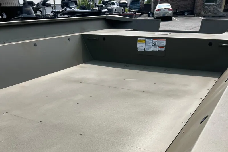 Slide: The Image of 2025 Tracker GRIZZLY 2072 Utility boat interior, spacious and durable design. - 2